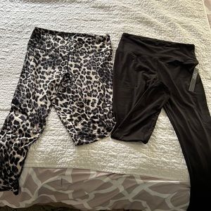 2 pairs of leggings. One black. One leopard.  SOLD TOGETHER AS A PAIR